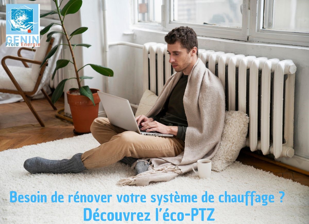 Homme emmitouflé avec une couverture, assis devant un radiateur, consultant des informations sur l’éco-PTZ pour la rénovation de chauffage avec Genin Froid Energie.
